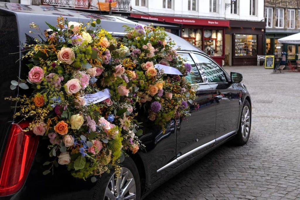 Hearse With Floral Tribute